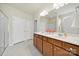 Bathroom featuring a double vanity with modern fixtures and a glass-enclosed shower at 20195 Dovekie Ln, Fort Mill, SC 29707