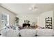 Inviting living room with hardwood floors, a comfortable sofa, and stylish decor at 20195 Dovekie Ln, Fort Mill, SC 29707