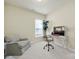 This home office has a light beige chair, desk, and lamp for a great space at 20195 Dovekie Ln, Fort Mill, SC 29707