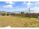 Backyard featuring a soccer net, fire pit and chairs on a well maintained lawn at 3157 Delaware Dr, Denver, NC 28037