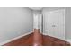 Bedroom featuring wood flooring and a closet at 3157 Delaware Dr, Denver, NC 28037