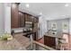 Modern kitchen featuring granite countertops, stainless steel appliances, and ample cabinet space at 3157 Delaware Dr, Denver, NC 28037