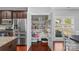 Walk-in pantry with wire shelving, next to stainless steel refrigerator and open to the kitchen at 3157 Delaware Dr, Denver, NC 28037