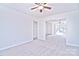 Open living area with view to entry and other rooms at 7033 Rothmore St, Charlotte, NC 28215