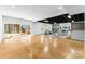 Finished basement with bar, fireplace, and sliding glass doors at 8508 Tirzah Church Rd, Waxhaw, NC 28173