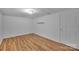 Finished basement space featuring wood laminate floors and neutral wall paint at 508 Deese St, Monroe, NC 28112
