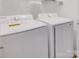Bright laundry room with white, modern Samsung washer and dryer appliances at 508 Deese St, Monroe, NC 28112