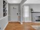Cozy living room featuring hardwood floors, a fireplace, and a welcoming entrance at 508 Deese St, Monroe, NC 28112
