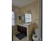 Double vanity bathroom with dark wood cabinets at 13123 Ashley Meadow Dr, Charlotte, NC 28213