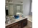 Bathroom with a double vanity and soaking tub at 13123 Ashley Meadow Dr, Charlotte, NC 28213