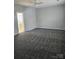 Large bedroom with grey carpet and access to bathroom at 13123 Ashley Meadow Dr, Charlotte, NC 28213