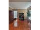 Bright home office with hardwood floors and built-in shelving at 13123 Ashley Meadow Dr, Charlotte, NC 28213