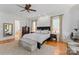 Bedroom with king-size bed, and access to bathroom at 18528 Nantz Rd, Cornelius, NC 28031