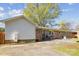 View of the home's back exterior, including a patio and fenced yard at 1924 Lakeview Dr, Rock Hill, SC 29732