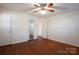 Bright bedroom with hardwood floors and ceiling fan at 1924 Lakeview Dr, Rock Hill, SC 29732