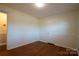 Well-lit bedroom featuring hardwood floors and a closet at 1924 Lakeview Dr, Rock Hill, SC 29732