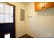 Laundry room with built-in cabinets and a door to the exterior at 1924 Lakeview Dr, Rock Hill, SC 29732