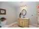 Traditional bathroom featuring tiled floor and marble vanity, toilet on left at 7029 Pebble Bay Dr, Denver, NC 28037