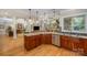 Open kitchen view with granite countertops and stainless steel appliances at 7029 Pebble Bay Dr, Denver, NC 28037