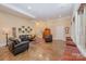 Spacious living room with leather seating and decor at 7029 Pebble Bay Dr, Denver, NC 28037