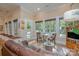 Living room with seating area overlooking the pool at 7029 Pebble Bay Dr, Denver, NC 28037