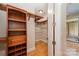 Walk-in closet with built-in shelving at 7029 Pebble Bay Dr, Denver, NC 28037