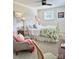 Bright bedroom with a white iron bed frame, soft linens, and neutral decor at 796 Cornelius Rd, Mooresville, NC 28117
