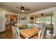 Open-concept dining area with views into the kitchen and living room at 796 Cornelius Rd, Mooresville, NC 28117