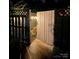Private gated entrance enhanced with landscape lighting at 796 Cornelius Rd, Mooresville, NC 28117