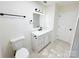 Modern bathroom with a sleek vanity, black fixtures, and updated tile flooring at 809 23Rd E St, Newton, NC 28658