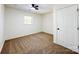 Cozy bedroom featuring neutral carpet, ceiling fan, and ample natural light at 809 23Rd E St, Newton, NC 28658