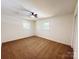 This cozy bedroom features neutral walls, a ceiling fan, and carpeting at 809 23Rd E St, Newton, NC 28658