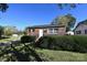 Charming brick home with well-maintained landscaping and a welcoming front entrance at 125 S Ervin Ave, Newton, NC 28658