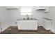 Well-lit kitchen featuring granite countertops and modern fixtures at 125 S Ervin Ave, Newton, NC 28658