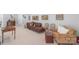 Spacious living area with eclectic decor and a mix of vintage furniture pieces at 18212 Pompano Pl, Cornelius, NC 28031