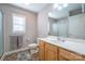 Bathroom featuring a sink, vanity, mirror, toilet, and tiled shower at 5039 Penn Rd, Iron Station, NC 28080