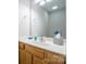 Bright bathroom with a wood vanity, a large mirror, and a clean, fresh aesthetic at 5039 Penn Rd, Iron Station, NC 28080