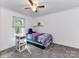 Bedroom with twin bed, ceiling fan and window blinds at 316 Carter Rd, Monroe, NC 28110