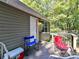 Small deck with two folding chairs and a cooler at 316 Carter Rd, Monroe, NC 28110