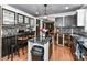 Kitchen with dark wood cabinets, granite island, and tile backsplash at 316 Carter Rd, Monroe, NC 28110