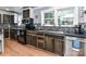 Modern kitchen with dark wood cabinets and stylish backsplash at 316 Carter Rd, Monroe, NC 28110