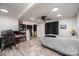 Bright bedroom with built-in shelving and hardwood floors at 1378 8Th Nw St, Hickory, NC 28601