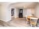 Bright dining area with wood table and chairs, and view into living room at 1378 8Th Nw St, Hickory, NC 28601