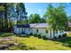 White ranch home with a backyard at 1378 8Th Nw St, Hickory, NC 28601