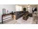 Living room with gray sectional sofa and view of front entryway at 1378 8Th Nw St, Hickory, NC 28601