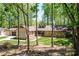 Ranch home with stone facade and mature trees at 315 Camelot Dr, Salisbury, NC 28144