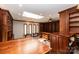 Sunlit library showcases extensive built-in bookshelves and a skylight at 315 Camelot Dr, Salisbury, NC 28144