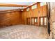 Spacious living room with high ceilings, stone fireplace and wood walls at 315 Camelot Dr, Salisbury, NC 28144