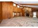 Spacious living room with high ceilings, stone fireplace and wood walls at 315 Camelot Dr, Salisbury, NC 28144