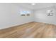 Bedroom with hardwood style floors and natural light from the windows at 3503 Linwood Rd, Gastonia, NC 28052